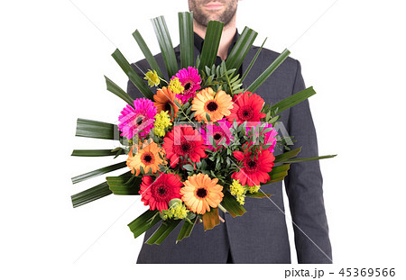 フラワー 花束 人 抱えるの写真素材