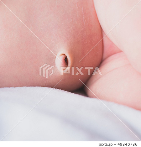 Newborn Hand and Navel with Umbilical Cord Just Fallen Off