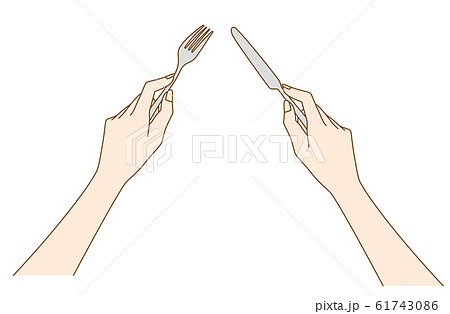 フォーク 食器 ボディパーツ 持つの写真素材