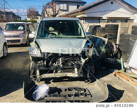 車 事故 大破 軽自動車の写真素材