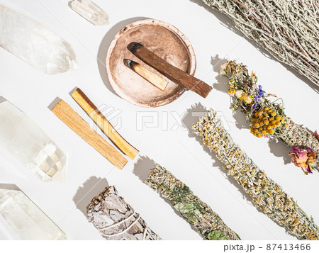 Items for spiritual cleansing - sage and various herbs bundles